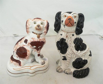 Lot 309 - Staffordshire dog on base and a black and white dog