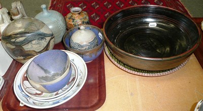 Lot 314 - Tray of studio pottery and a slip ware dish, large studio pottery vase and a tenmoku bowl