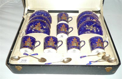 Lot 319 - A set of six George Jones coffee cans and saucers and sex matching silver and enameled...