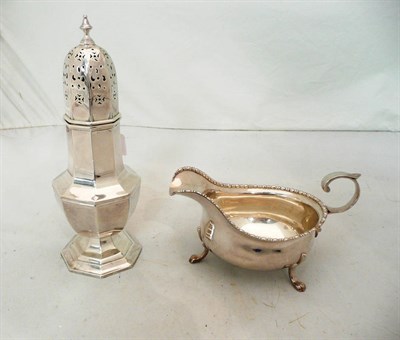 Lot 328 - A silver sugar castor and a silver sauce boat