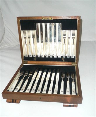 Lot 340 - A cased set of twelve silver dessert knives with mother of pearl handles (one handle a.f.)