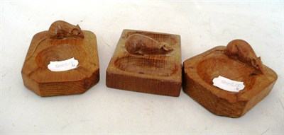 Lot 344 - Two Mouseman oak ashtrays and a Mouseman oak pin dish