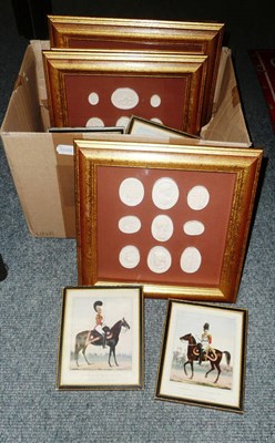 Lot 347 - Four framed and glazed displays of plaster seals and set of six framed military prints