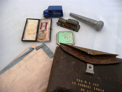 Lot 371 - A 9ct gold mark Mason's jewel and two aprons, a white metal parasol handle, a Dinky Toys Trojan...