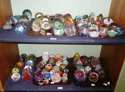 Lot 383 - A quantity of paperweights two shelves