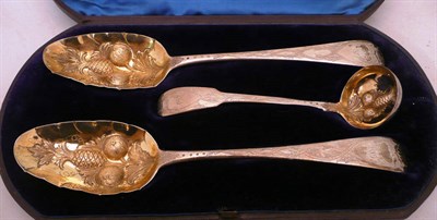 Lot 397 - Three silver gilt berry spoons (cased)