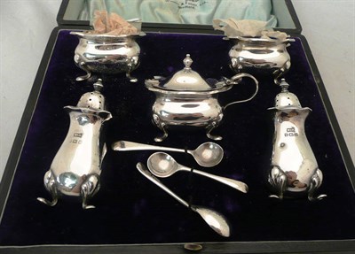 Lot 402 - A silver five piece condiment set - cased