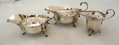 Lot 405 - Two silver sauce boats and a cream jug, 9oz