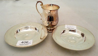 Lot 406 - Two silver coasters and a silver mug, 10oz (3)