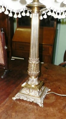 Lot 419 - A pair of brass column table lamps