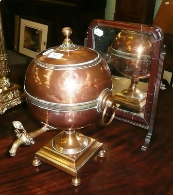 Lot 420 - A copper and brass tea urn and a Georgian toilet mirror