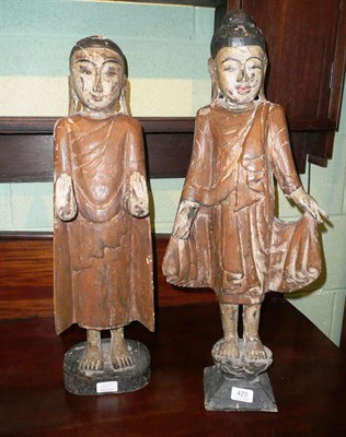 Lot 423 - Pair of carved polychrome wooden figures