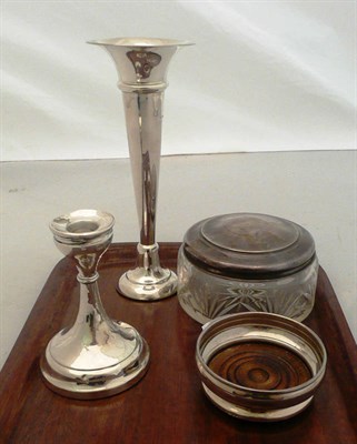 Lot 429 - Silver trumpet vase, candlestick, silver coaster and a silver topped jar (4)