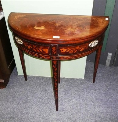 Lot 516 - Dutch marquetry demi-lune fold-over table