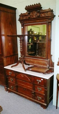 Lot 517 - A Victorian walnut washstand with tall mirrored superstructure