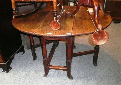 Lot 536 - An 18th century oak gate leg table