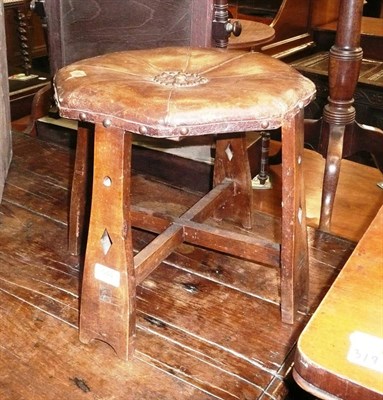 Lot 544 - Arts & Crafts leather stool