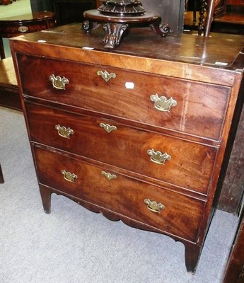 Lot 548 - George III mahogany three height chest