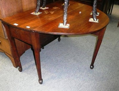 Lot 562 - George III pad foot, drop leaf table