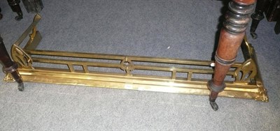 Lot 566 - Arts & Crafts brass fender