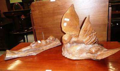 Lot 567 - Carved wooden sculpture of an otter by W. Wild and another carving of two birds (2)