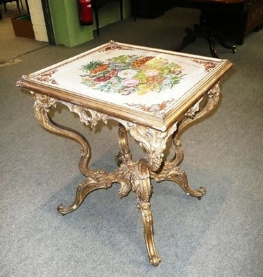 Lot 571 - Victorian gilt and gesso centre table with floral tapestry insert