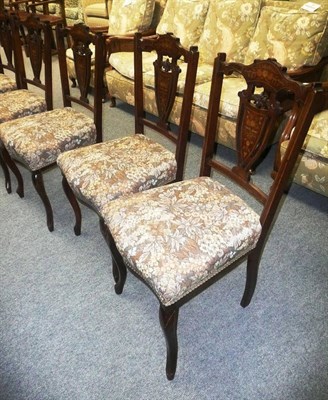 Lot 586 - A set of six late Victorian/Edwardian inlaid rosewood salon chairs