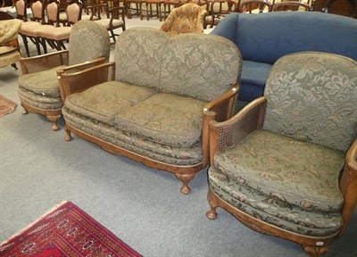 Lot 591 - A three piece bergere suite