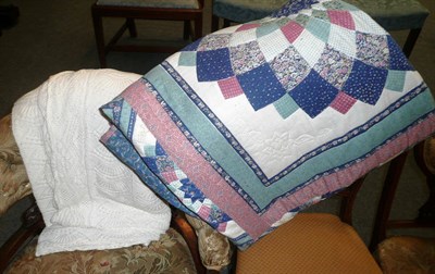 Lot 593 - A crocheted bed throw and patchwork quilt