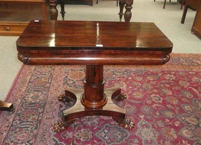 Lot 602 - 19th century rosewood fold over tea table