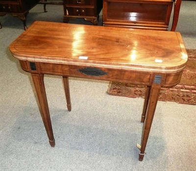 Lot 606 - George III mahogany fold over tea table