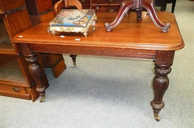 Lot 614 - A Victorian Oak small dining table