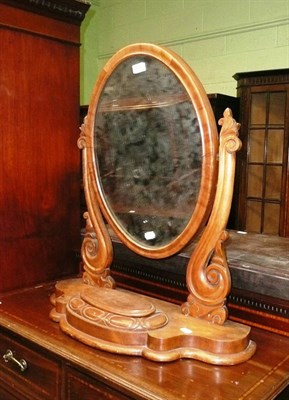 Lot 635 - A Victorian walnut toilet mirror