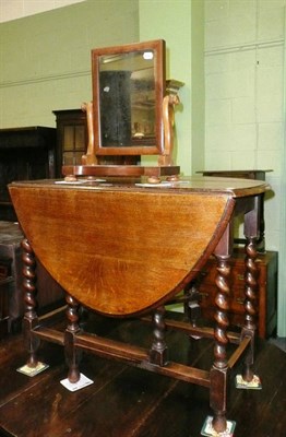 Lot 636 - Oak gate leg table, small Victorian toilet mirror and an oak framed mirror