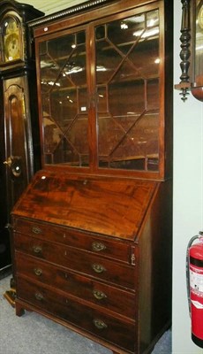 Lot 668 - George III Mahogany bureau bookcase