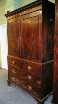 Lot 671 - A Georgian mahogany linen press