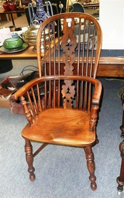 Lot 677 - A late 18th/early 19th Yew and elm high back Windsor chair with crinoline stretcher and...