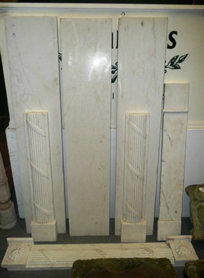 Lot 789 - A white marble fireplace