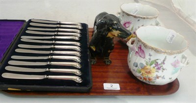 Lot 2 - A Doulton dachshund, a pair of Dresden cache pots (a.f.) and a cased set of twelve silver...