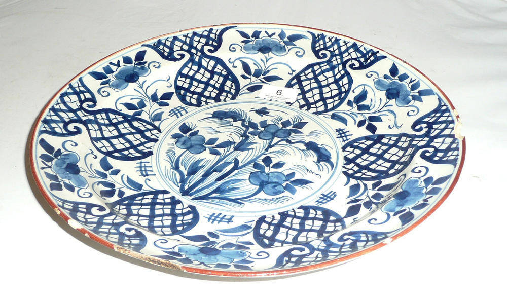 Lot 6 - Delft charger with floral decoration