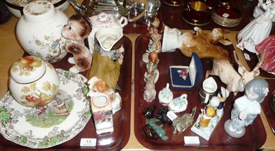 Lot 13 - A quantity of decorative ceramics including Lladro, Beswick, Royal Dux and Hummell on two trays