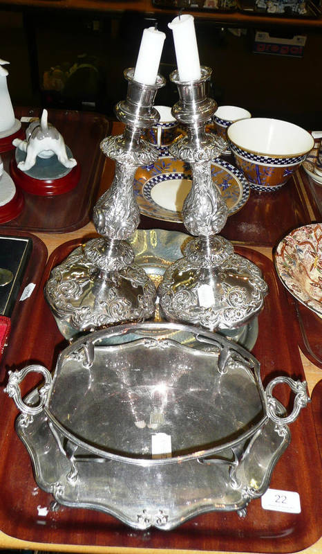 Lot 22 - A pair of loaded plate candlesticks, a plated stand and two pewter dishes