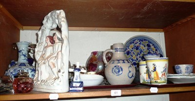 Lot 61 - Staffordshire flatback figure, blue and white ceramics, etc on a shelf