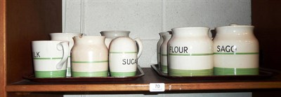 Lot 70 - A quantity of green and white storage jars, etc