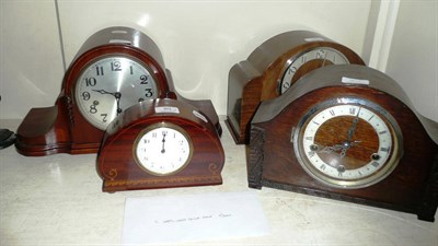 Lot 80 - An inlaid timepiece and three chiming mantel clocks