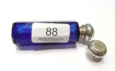 Lot 88 - A blue panelled glass double ended scent bottle with white metal covers (a.f.)