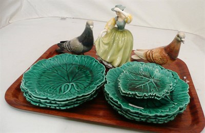 Lot 115 - Two Beswick pigeons, a Doulton figure, eight Wedgwood green plates and two leaf dishes
