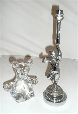 Lot 119 - A chromium plated cherub lamp and a Daum glass bear