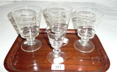 Lot 121 - A set of three 19th century rummers and a smaller wine glass, cut and etched with horse racing...