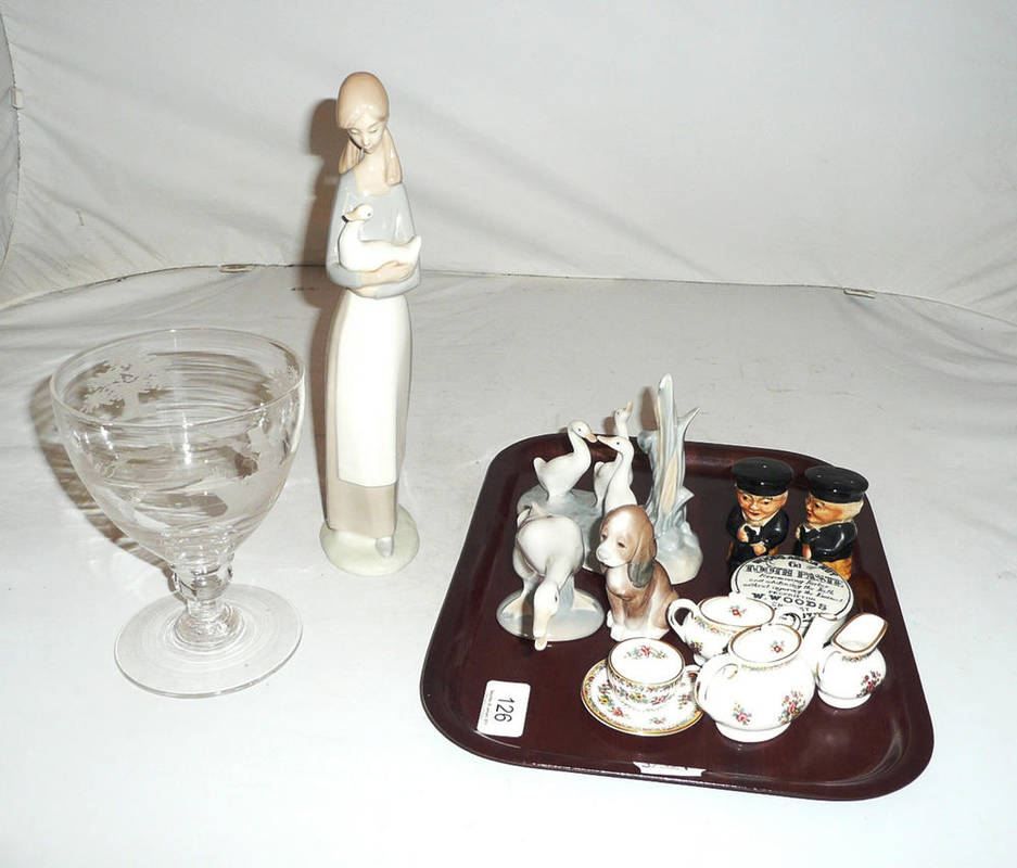 Lot 126 - A tray including Lladro, Nao, a goblet etched with a hunting scene, a pot lid, etc